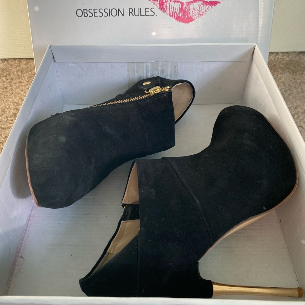 Obsession Rules, suede black booties, stilettos.